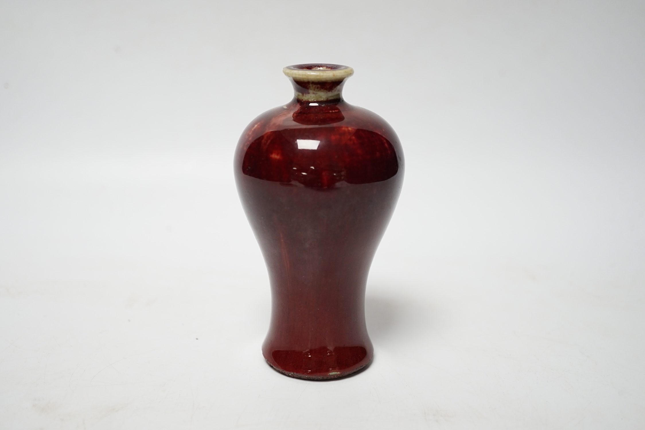A small Chinese sang de boeuf meiping, 18th/19th century, 11cm high